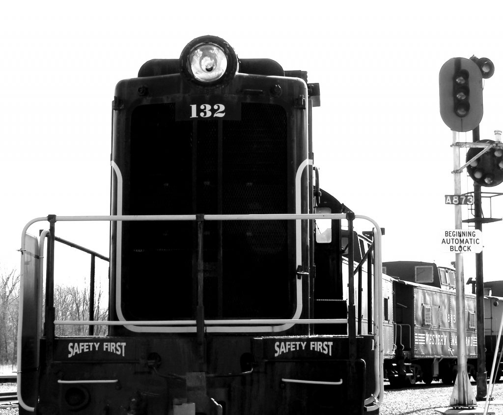 Head on photo of diesel engine 132 and caboose rolling stock at the Hagerstown Roundhouse Museum.