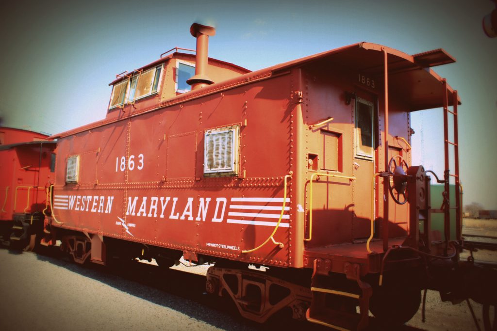 Rolling stock at the Hagerstown Roundhouse Museum - a side view of Western Maryland caboose #1863