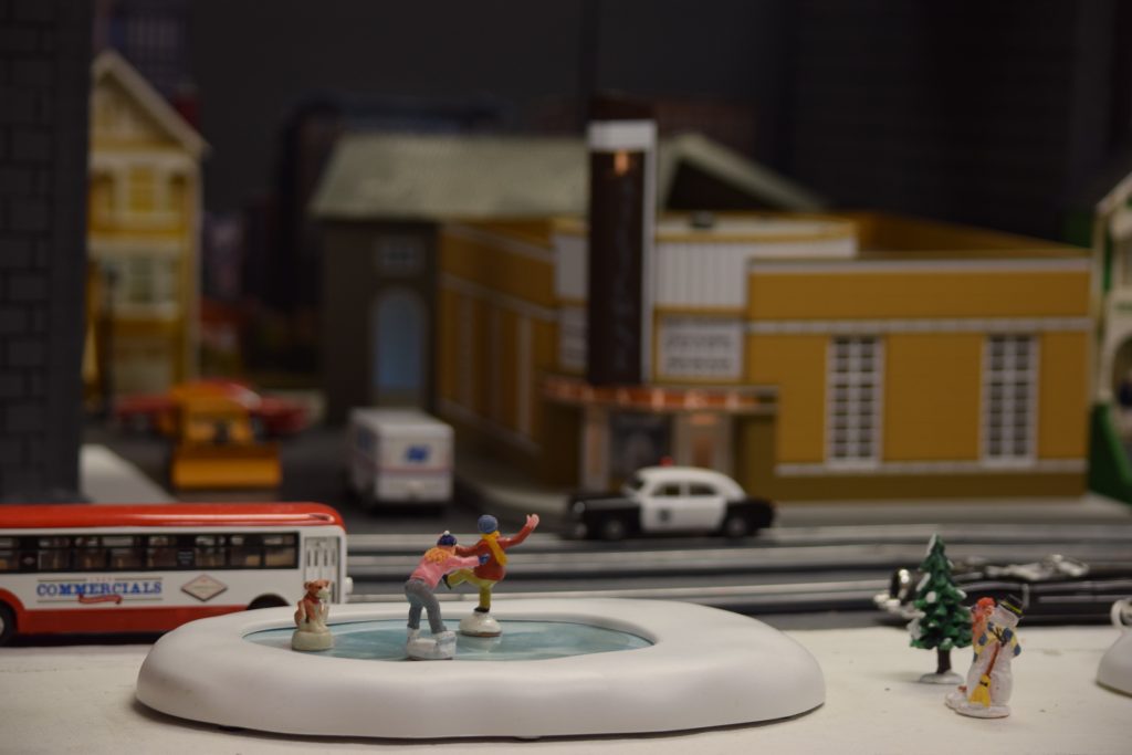 An ice skating scene in town - "Christmas at the Roundhouse" model train display.