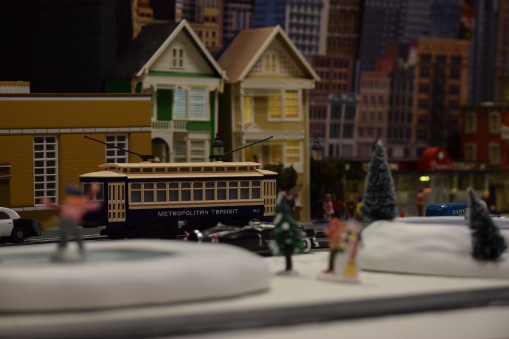 Trolly car and city scape - "Christmas at the Roundhouse" model train display.