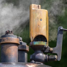 Close-up of a steam whistle on train