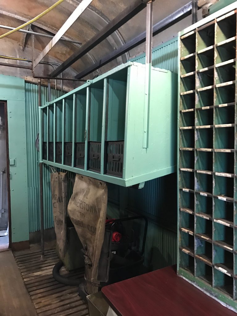 Worker lockers and slots inside historical building at the Hagerstown Roundhouse Museum.